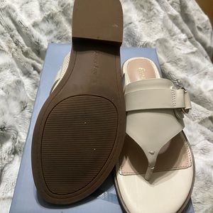 Pair of off white sandals worn once